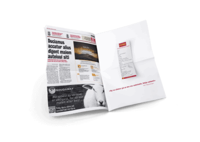 Mockup av avis med Saudamat og Coop extra reklame